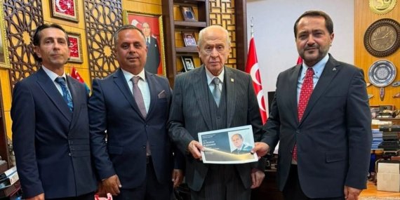Yilmazdan-Genel-Baskan-Bahceliye-kongre-raporu-featured